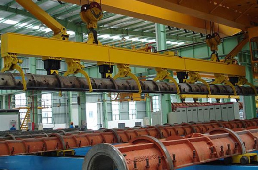 回轉(zhuǎn)型管樁生產(chǎn)線的平面布置方案對比